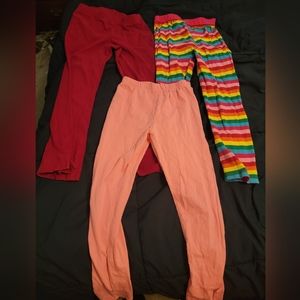 Three pairs of girls leggings size 7-8